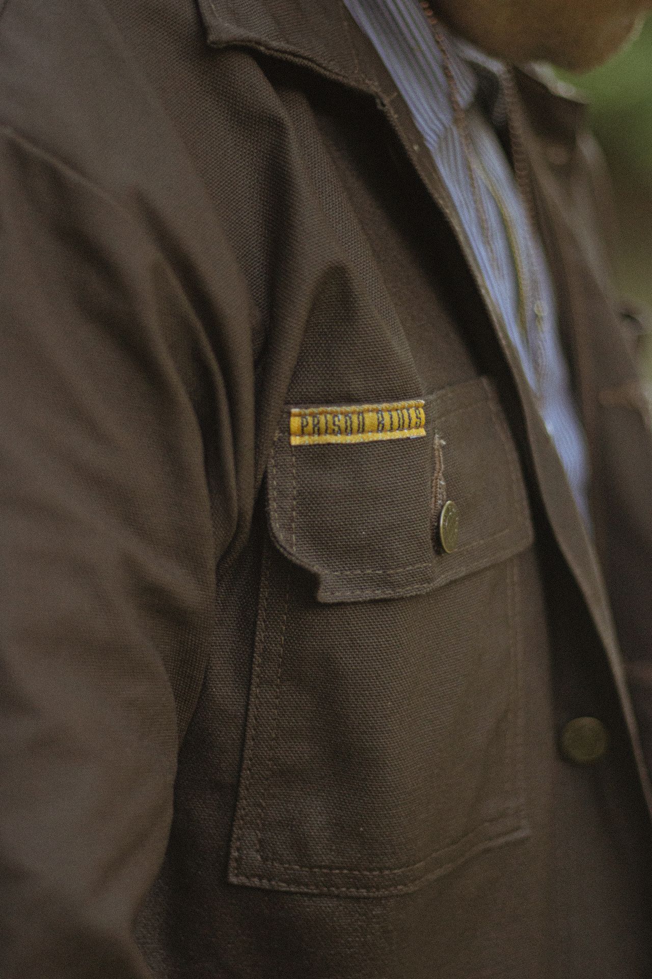 Close-up of a durable workwear jacket showcasing craftsmanship and rugged style.